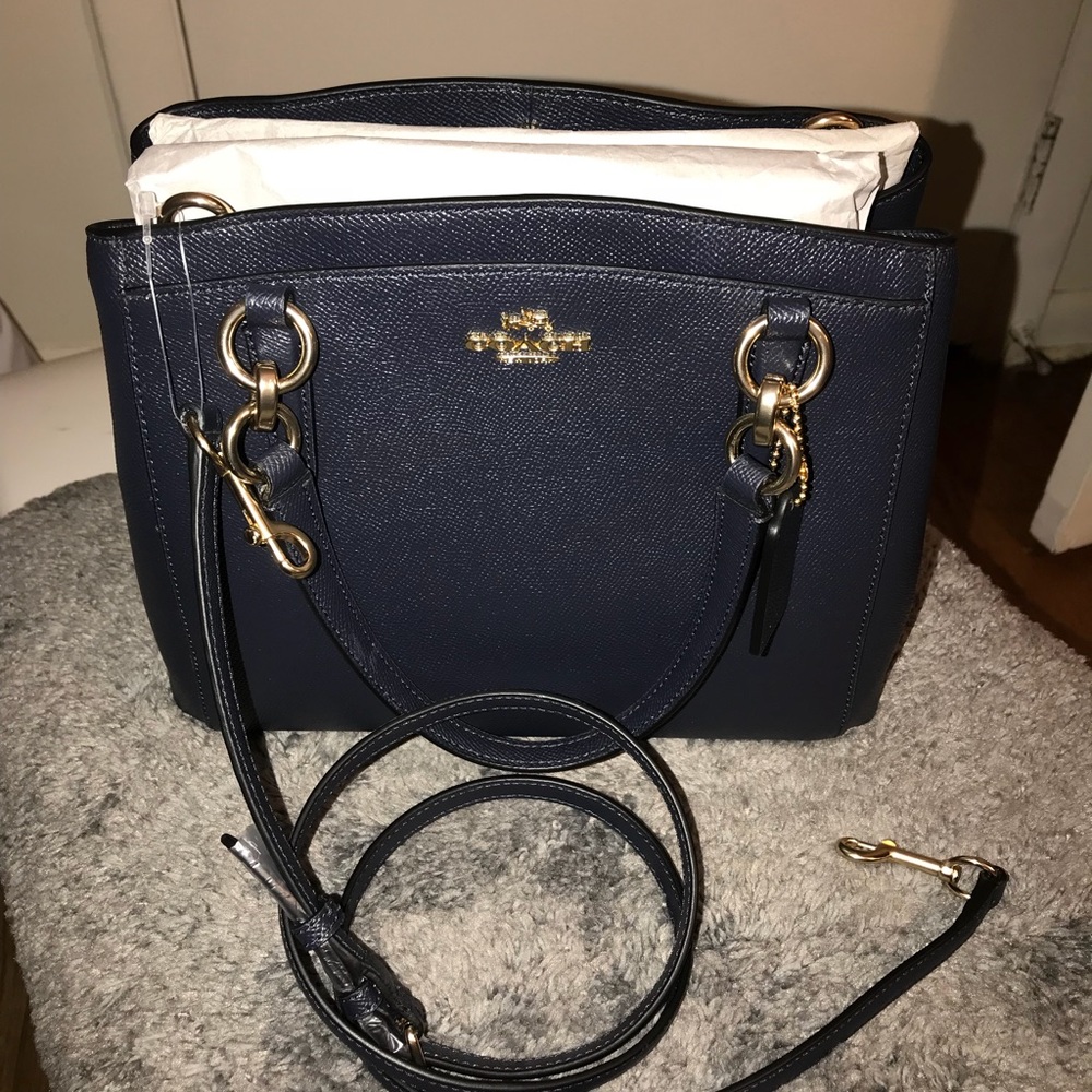 Sold..MInetta coach authentic brand new